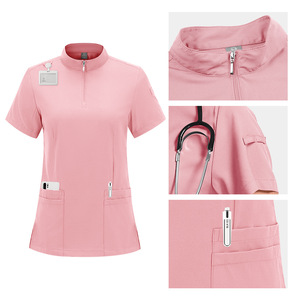 Women's Pink Scrub Top Short Sleeve Zip Front With Pockets For Medical Use Moisture Wicking Hospital Uniforms - Product Image 1