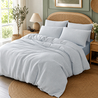 Ensemble de literie personnalisé OEM ODM en coton épais teint en masse à rayures, ensemble de literie 4 pièces uni, drap doux froissé bicolore pour la maison et l'hôtel