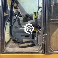 Excavatrice compacte sur chenilles d'occasion CAT 310 avec moteur puissant et performances hydrauliques fluides