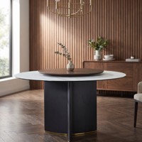 Table à manger ronde moderne de luxe pour les réunions de famille, avec plateau en marbre et base sur piédestal