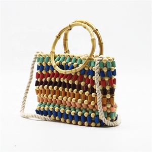 2024 bolso <span class=keywords><strong>de</strong></span> mano multicolor con cuentas multicolor con mango <span class=keywords><strong>de</strong></span> <span class=keywords><strong>madera</strong></span> bolso <span class=keywords><strong>de</strong></span> hombro con cuentas <span class=keywords><strong>de</strong></span> <span class=keywords><strong>ganchillo</strong></span> <span class=keywords><strong>de</strong></span> paja <span class=keywords><strong>para</strong></span> mujer - Product Image 6