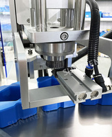 Machine automatique rotative de remplissage et de scellage de flacons de parfum et de liquides parfumés sous vide