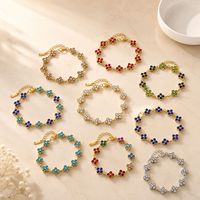 Nouveauté transfrontalière : Bracelet trèfle à quatre feuilles, design élégant et avant-gardiste, entièrement pavé de zircons, haute qualité