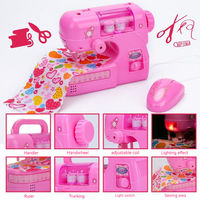 Nouvelle machine à coudre électrique miniature rose en plastique pour enfants - Point de chaînette, aiguille simple, sûre et facile à utiliser, pour usage domestique