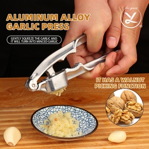 Manual Aluminum Alloy Garlic Press Kitchen Tool for Crushing Chopping Garlic, Fruits Vegetables with Easy-Clean Handle - Product Image 1