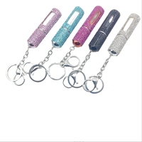Le distributeur de parfum transfrontalier de 5ml peut être ajouté plusieurs fois clé de vaporisateur portable cloutée de diamants