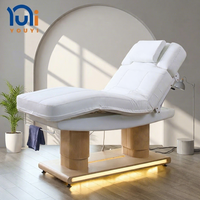 Lit de beauté électrique blanc à 4 moteurs, chauffant et réglable, pour soins du visage et massage, avec base dorée LED pour salon