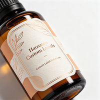 Étiquettes personnalisées Haoxuan pour flacons d'huile de beauté, autocollants en papier d'art gaufré à l'or pour emballages cosmétiques haut de gamme