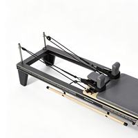 Reformer de Pilates portable et réglable noir avec cadre en alliage d'aluminium pour usage domestique et petits studios de fitness