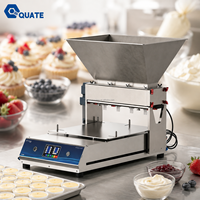 Déposeuse de pâte à cupcakes et muffins en acier inoxydable pour boulangerie commerciale, idéale pour la production de petits gâteaux en pâtisserie.