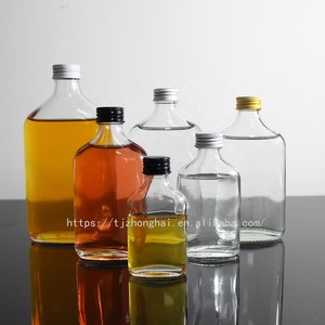 Tùy Chỉnh 100Ml 200Ml 500Ml 700Ml Phẳng Nước Ép Trái Cây Đồ Uống Rượu Lạnh Brew Cà Phê Trà Chai Thủy Tinh Với Màn Hình In Ấn Logo - Product Image 2