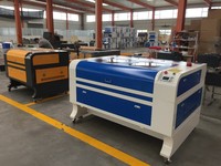 Machine de gravure laser au dioxyde de carbone mini 1080 60w 80w et machine de découpe laser CO2 de bureau, prix pour le bois, le verre, l'acrylique, le MDF