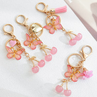Fruitvormige sprankelende kersen strik-sleutelhanger Creatieve delicate frisse zoete sleutelhanger van kunststof hars