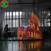 PH3.91-7.81 de fenêtre rideau en verre HD5000nits a mené l'écran transparent visuel de la maille LED de panneaux de mur pour la publicité de magasin