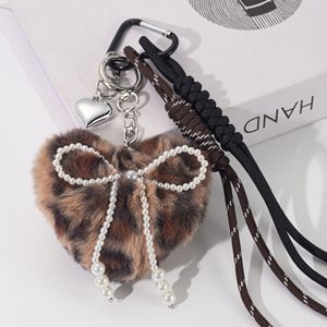 Sac d'amour en peluche <span class=keywords><strong>à</strong></span> imprimé léopard créatif pendentif Senior Sense <span class=keywords><strong>bricolage</strong></span> corde boule de <span class=keywords><strong>laine</strong></span> porte-clés amour délicat ornements suspendus - Product Image 2