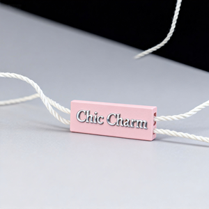 Etichetta di sicurezza personalizzata NON RESTITUIBILE se rimovuta, in plastica bianca goffrata, per orologi e gioielli. - Product Image 1