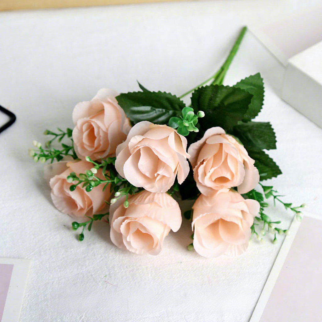 Champagne-colored peach-scented rose