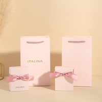 Boîte à bijoux avec nœud papillon et ruban rose, couvercle estampé haut et bas, emballage pour rangement de colliers et bagues, boîte cadeau