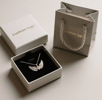 Boîte d'emballage de bijoux élégante au design élégant-Solution haut de gamme pour bagues, colliers et accessoires