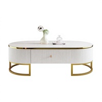 Table basse ovale moderne de style farmhouse de 47,2 pouces avec tiroirs, design profilé incurvé, finition en métal doré blanc + or, meubles de salon