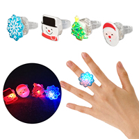 Lampu Cincin LED Natal Grosir, Mainan Jari Menyala untuk Anak-anak, Souvenir Pesta, Kepingan Salju, Santa, Manusia Salju, Lampu Berkedip Menyala dalam Gelap