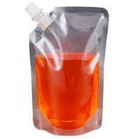 Vente en gros plastique transparent jetable boisson Whisky lait thé café boisson jus eau liquide pochette de voyage portable à bec verseur