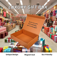 Vente en gros de boîte cadeau magnétique de luxe haut de gamme emballage de vêtement pliable avec logo personnalisé et ruban