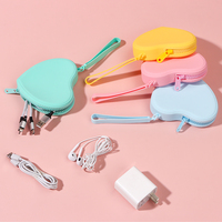 Mini pochette en silicone pour femme, mignonne et portable, pour la monnaie, les clés, les cosmétiques, vente en gros, organisateur de voyage personnalisé, sac à main