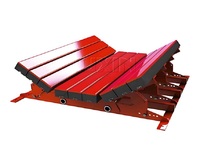 Lit de tamponnage anti-corrosion et absorbant les chocs pour convoyeurs miniers robustes de la marque JUXIN, idéal pour les secteurs de l'énergie et des mines