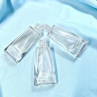 Flacon de parfum en verre mat transparent de 10 ml en gros avec impression sérigraphiée, design de poche, pulvérisateur à fine brume et applicateur à bille