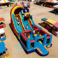 Structure gonflable à double toboggan sur le thème de l'éléphant de cirque, en PVC écologique, marque DST, couleurs personnalisées, logo, garantie 3 ans, pour enfants