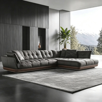 Canapé d'angle modulaire en tissu gris foncé capitonné avec base en bois massif pour grand salon moderne