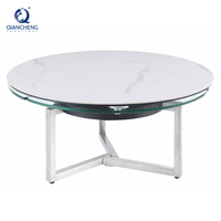 Vente en gros de Foshan Table basse pivotante en acier inoxydable de style moderne avec plaque de roche en céramique mobile Table centrale rotative en verre