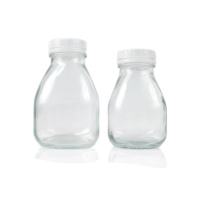 Bouteilles de boisson de jus de fruits de lait en verre vides de forme carrée courte de 10oz 16oz avec le chapeau inviolable blanc