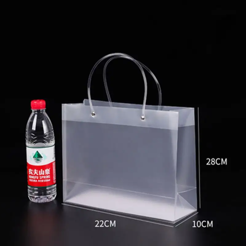 Clear PVC plastic shopping bag with snap button transparent handle bagsClear Plastic Bags With Handles