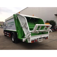 Camion compacteur de déchets Isuzu ELF 4x2, camion à chargement arrière, véhicule de compression des déchets