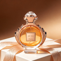 Flacon de parfum rond en verre de luxe avec pompe pulvérisatrice 30ml 70ml 100ml, boîte d'emballage personnalisée avec logo imprimé pour marque de parfum
