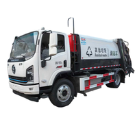 Camion à ordures compacté à énergie nouvelle, alimenté par batterie, SHACMAN 4*2, fabriqué en Chine.