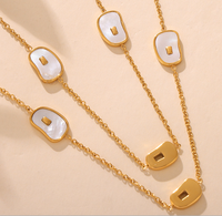 Aretas Collier à chaîne bijoux en acier inoxydable, métal plaqué or, hypoallergénique, collier à longue chaîne en coquillage naturel