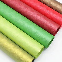 Papier gaufré couleur personnalisée 110-500 g/m² en carton texturé pour emballage de boîtes rigides haut de gamme et solution d'emballage cadeau pour le branding