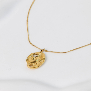 Ladmétalliques — collier avec pendentif organique en acier inoxydable, plaqué or, 316L, tendance, pendentif à texture bombée, avec porte-bonheur, design - Product Image 1
