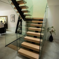 Escalier intérieur flottant moderne en U avec marches en bois massif, garde-corps en verre, monopoutre, forme et taille personnalisées