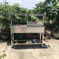 Barbecue au charbon de bois Santa Maria Grill, hauteur réglable, système de levage à cliquet et à griffes, barbecue argentin