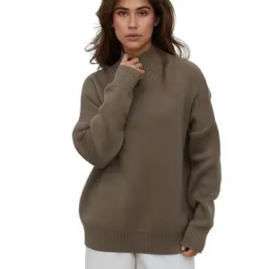 Alla moda versione ampia del maglione a maniche lunghe a tinta unita maglione a collo alto atmosferico semplice da donna