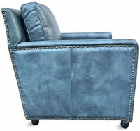 Fauteuil en bois avec revêtement en cuir, structure robuste, coussin confortable, style classique élégant, chaise de salon