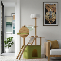 Arbre à chat d'intérieur vert de Noël, grand, en bois, avec structure d'exploration, nid, maison, griffoir floral et pilier de saut autoportant