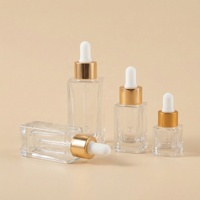 Bouteilles en verre cylindriques élégantes avec compte-gouttes, fond renforcé, finition mate, pour huiles essentielles et cosmétiques, 5ml, 10ml, 15ml, 30ml, avec emballage carton.