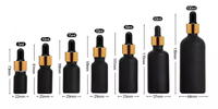 Flacons compte-gouttes en verre cosmétique pour huiles essentielles de 20 ml et tube en papier noir personnalisé