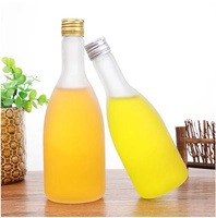Botellas de vidrio para bebidas y zumo, fabricante de China, con logotipo OEM, a granel