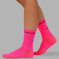 Calcetines populares para correr personalizados con colores Calcetines de ciclismo con logotipo personalizado Calcetín de equipo de calidad de nailon